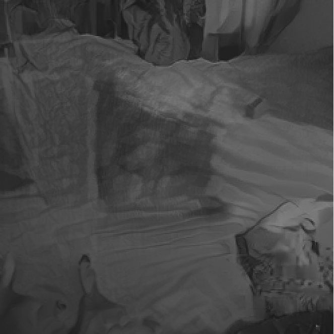 A new AI generated caption: A man laying on top of a bed under a blanket.