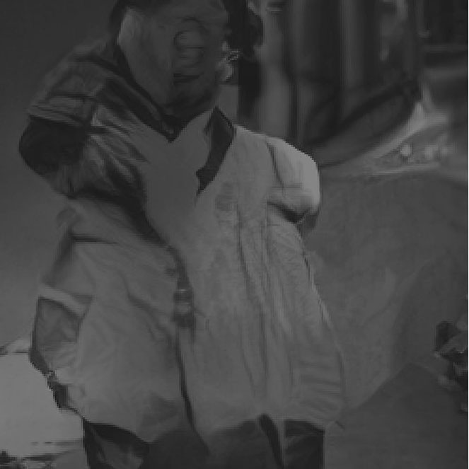 A new AI generated caption: A masculine looking person looking out into the sunset.